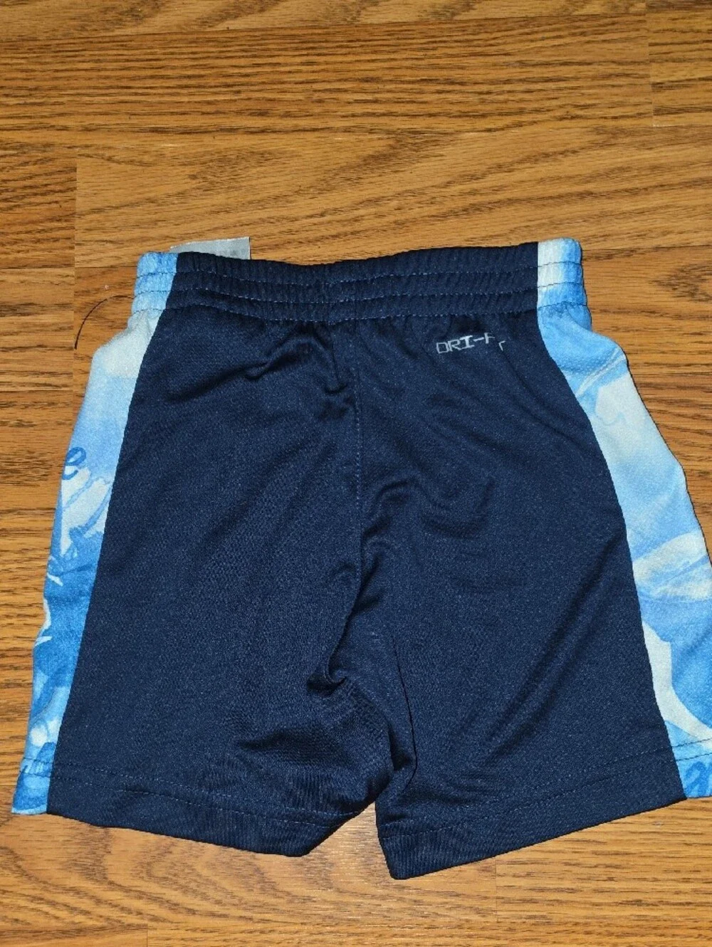 Nike White Tank Top with Blue 'JUST DO IT.' Graphic